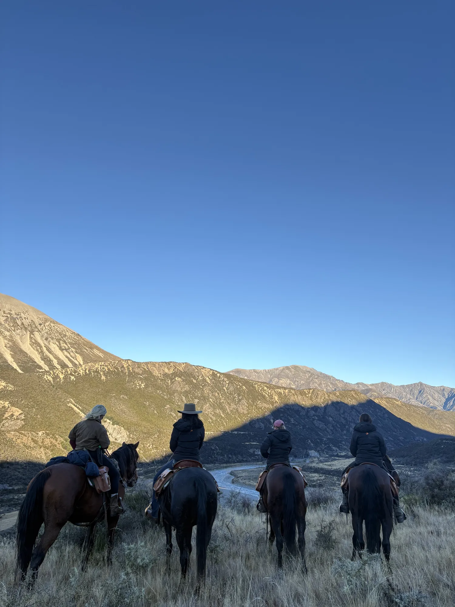 Riders on a frosted morning above the Waiau valley, St James